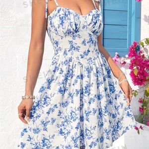 Blue and White floral mini dress size small